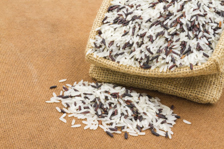 white rice and berry rice in small burlap sack