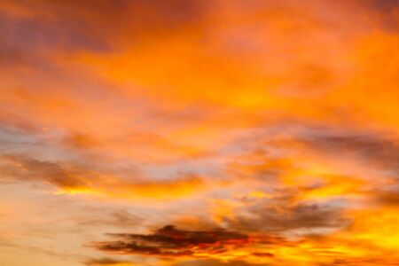 Dramatic sunrise sky with clouds.Blur or Defocus image.の写真素材