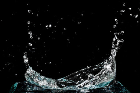 Water splash isolated on black background
