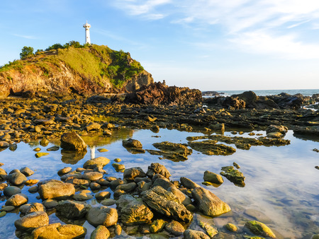 Seascape with the old lighthouse on the Koh Lanta island,Thailandの写真素材