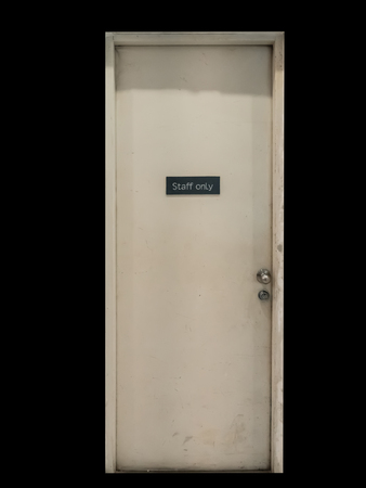 Staff only sign on a old door.の写真素材