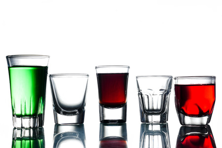 Collage of glasses with cocktail on a white background.の写真素材