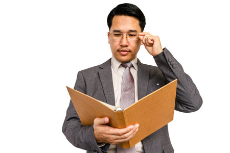 Businessman holding  file folder on a white background.の写真素材