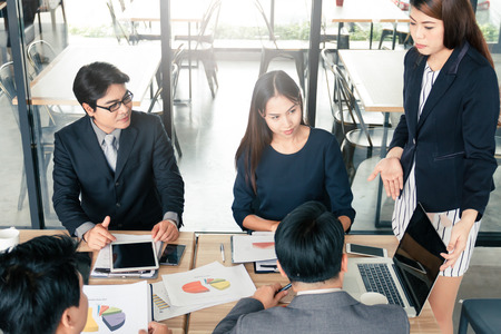 Asian business people meeting discussion working in cafe.の写真素材
