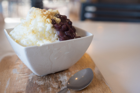 Shaved ice with red bean and milk.の写真素材