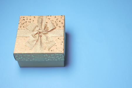 Top view of gift box on blue background. Free space for textの写真素材