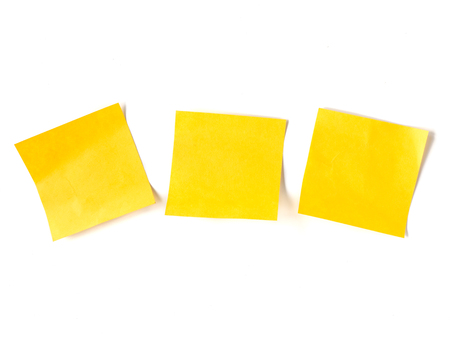 Yellow stick notes paper on white background.