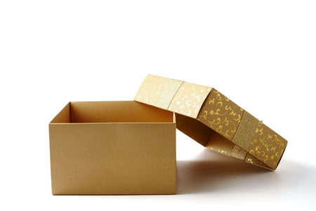 Open golden gift box on a white background.の写真素材