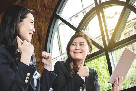 Asia business women discussing and meeting together in the office. Successful business conceptの写真素材