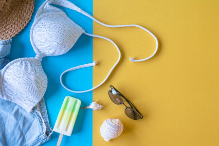 Top view of beach summer accessories on colorful background, Vacation and travel items.