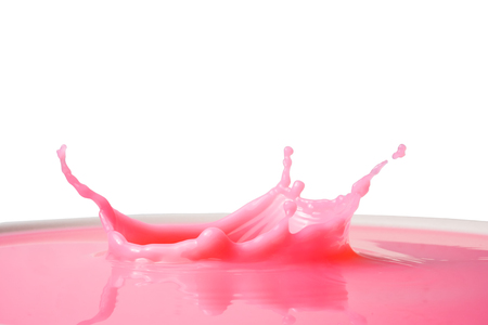strawberry milk splash on white backgroundの写真素材