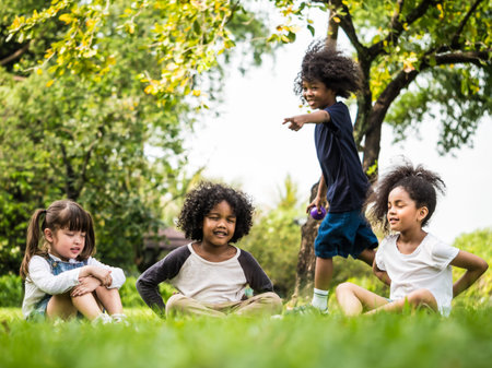 Group of children playing together in the park