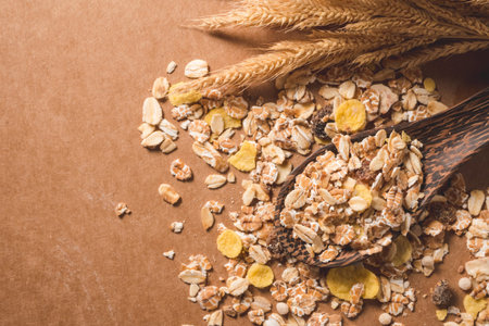 Top view of Oatmeal flakes on wooden table. Healthy breakfast concept. copy space