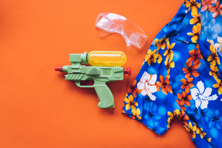 Top view of Summer accessories on orange background. copy spaceの写真素材