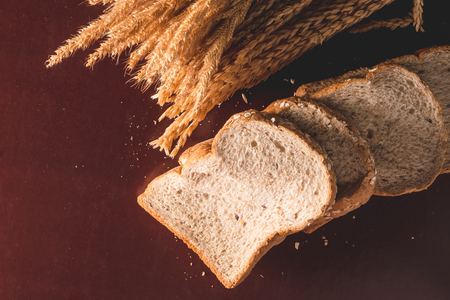 Slices of whole wheat bread on the table. Top viewの写真素材