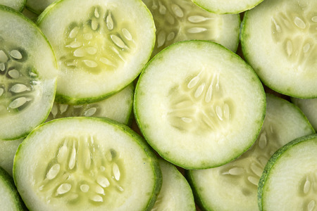 Fresh cucumber slices backgroundの写真素材