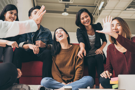 Asian Officers are meeting together with comfortable feeling at the office.の写真素材
