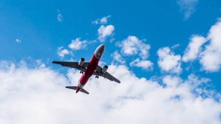 Airplane flying on blue sky. Free space for text