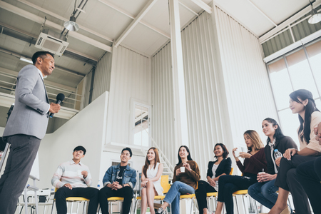 Businessman is explaining works to officers while training together at the office.の写真素材