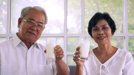 Asian elderly couple spending time together at home.の写真素材
