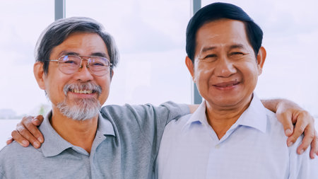 Portrait of two smiling senior men.の写真素材