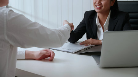 Business people shaking hands, finishing up a meeting