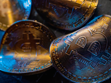 Twisted gold coins with bitcoin symbol. Concept of a cryptocurrency market crisis.