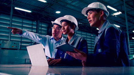 A team of engineers is explaining remote machine control to industrial owners.