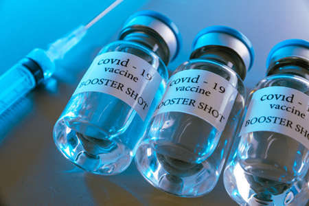 COVID-19 booster vaccine vials. Medicine and health care conceptの写真素材