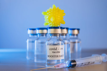 COVID-19 booster vaccine vials. Medicine and health care conceptの写真素材