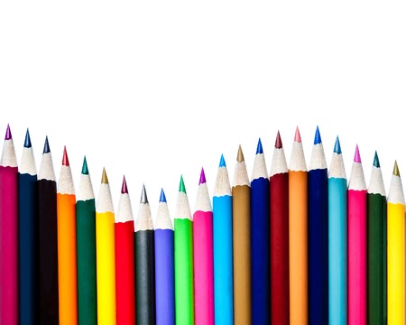 A row of color pencils isolated on white backgroundの写真素材