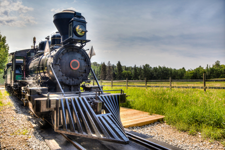 A vintage locomotive steam engine with copy space.の写真素材