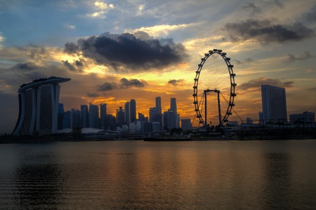 A golden sunset over Singapore skyline.のeditorial素材