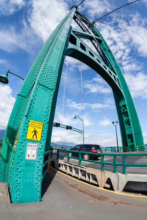 Opened in the 1938, Vancouver's Lions Gate Bridge spans the Burrard Inlet and connects the city to the Northshore municipalities. The bridge is a National Historic Site of Canada since 2005.のeditorial素材