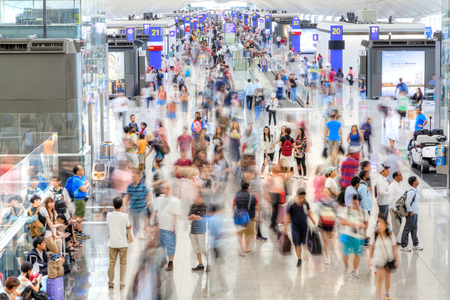 HONG KONG - JULY 16, 2017: Passengers at the departure terminal of Hong Kong Chek Lap Kok International Airport, the world's busiest cargo gateway and one of the world's busiest passenger airports.のeditorial素材
