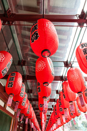 SINGAPORE - SEPTEMBER 11, 2017: Red Chinese lanterns decorate around the Buddha Tooth Relic Temple in Chinatown during the Mid-Autumn Festival, also known locally as Mooncake or Lantern Festival.のeditorial素材