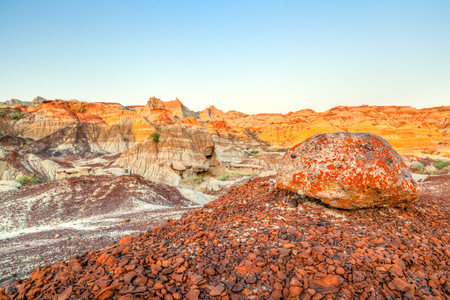 Sun setting over Dinosaur Provincial Park in Alberta, Canada.の写真素材