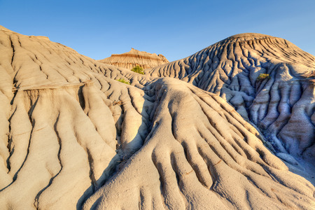 Sun setting over Dinosaur Provincial Park in Alberta, Canada.の写真素材