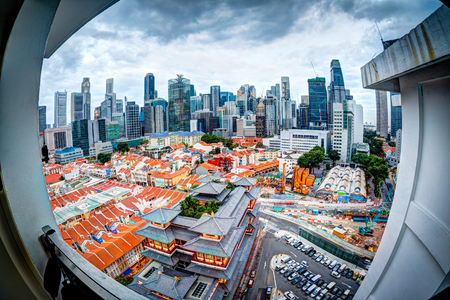 Fisheye view of Singapore's Chinatown with the business district in the background, as shot from the corridor of a highrise public apartment building.のeditorial素材