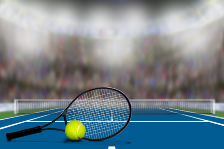 Low angle view of Tennis court full of spectators in the stands with copy space. Deliberate focus on foreground with shallow depth of field on background.の写真素材