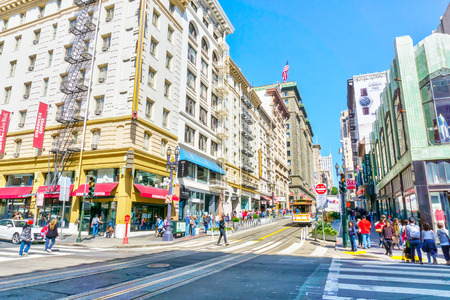 SAN FRANCISCO - APR 2, 2018: A crowded street on Powell in heart of downtown San Francisco where shops and restaurants abound.のeditorial素材