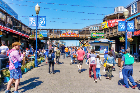 SAN FRANCISCO - APR 2, 2018: Visitors flock to Pier 39 at San Francisco's Fisherman's Wharf renowned for its varied attractions, shops and seafood.のeditorial素材