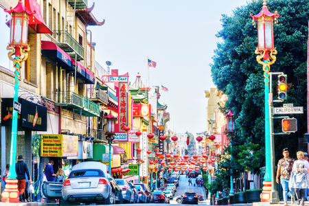 SAN FRANCISCO - APR 2, 2018: Red lanterns hang along busy Grant Avenue in the heart of San Francisco Chinatown. Teeming with Chinese restaurants and shops, it is one of the oldest and largest Chinatowns in North America.のeditorial素材