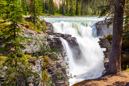 Athabasca Falls in Jasper National Park on the Icefields Parkway in Alberta, Canada. A Class 5 waterfall, it is the most powerful waterfall in the Canadian Rockies.の写真素材