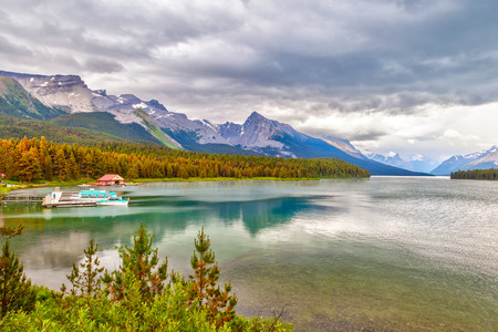 Maligne Lake with its landmark Boat House dock in Jasper National Park, Alberta, Canada. The lake is famous for the surrounding peaks and the three visible glaciers.のeditorial素材