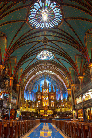 MONTREAL, CANADA - AUG 20, 2012: Interior of the historic Notre-Dame Basilica in Montreal, Quebec, Canada. A national historic site of Canada, the gothic-style Church was the largest in North America when it ws built in 1829. Vertical orientation.のeditorial素材