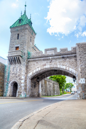 Erected by the British in 1879, Porte Kent is part of the Ramparts of Old Quebec City, the only remaining fortified city walls in North America north of Mexico. It was named after Queen Victoria's father The Duke of Kent.の写真素材