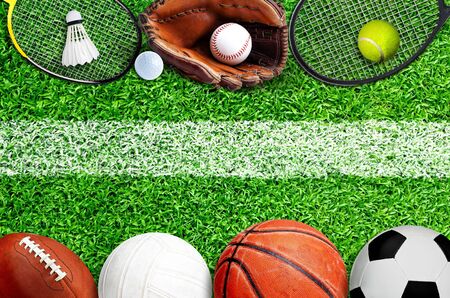 Top down view of popular sports equipment on field with painted white line marking for text copy space.の写真素材