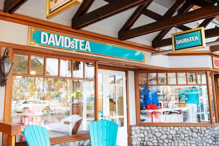 BANFF, CANADA - FEB 15, 2020 : Famous Canadian-based DavidsTea shop with its sign on busy Banff Avenue in Alberta, Canada. It is the largest Canadian-based specialty tea boutique in the country.のeditorial素材