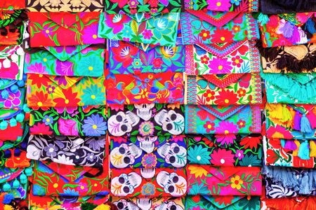 Typical Mexican embroidery craft on sale at a souvenir shop along 5th Avenue Playa del Carmen in Riviera Maya, Cancun, Mexico.の写真素材